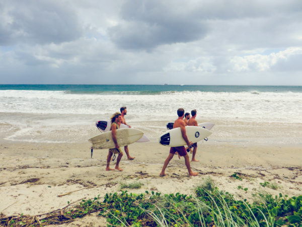 Surfers in Byron Bay